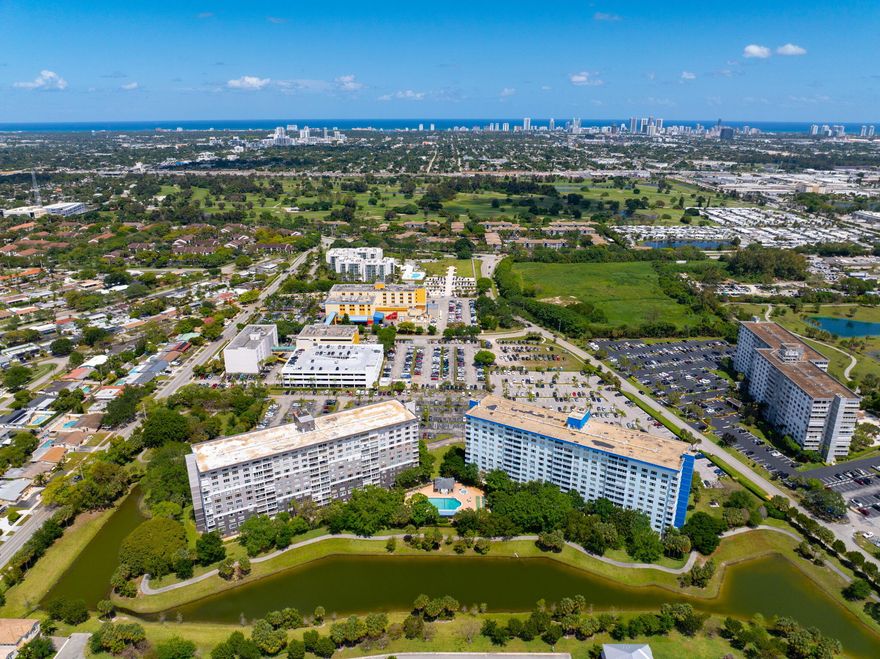 Welcome to Unit 406 at Hillcrest East 26 in Hollywood. This 1 bedroom, 2 bath residence sits on the 4th floor and lives larger than its layout suggests. The flexible floor plan can be converted to a 2 bedroom, giving you a rare value play in a 55+ building where extra sleeping space is at a premium. Perfect for hosting family, a home office, or future resale flexibility. The screened balcony  offers fresh Florida breezes and  views. Tile flooring, Clean kitchen. Move in Ready The building passed all SIRS and 40-year safety inspections. Recent capital projects include a new roof and modernized elevators. Monthly maintenance covers water, sewer, cable with HBO, and internet.  Flexible 1/1 layout with conversion potential to 2 bedroom. Building completed SIRS, 40-year recertification, and milestone inspections. Reserves fully funded per Florida statute. Unit equipped with fire sprinklers. Assigned parking plus guest spaces. Common laundry on each floor. At least one occupant must be 55 or older per association rules.