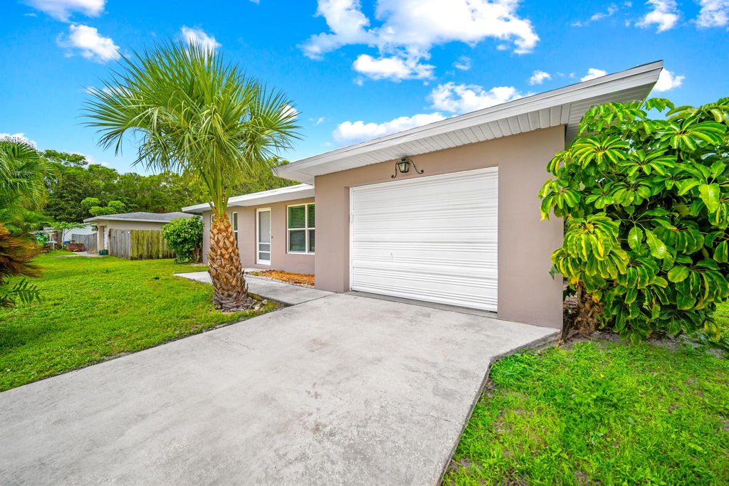 Photo of 358 NE Floresta Drive, Port Saint Lucie, FL 34983 (MLS # R11002578)