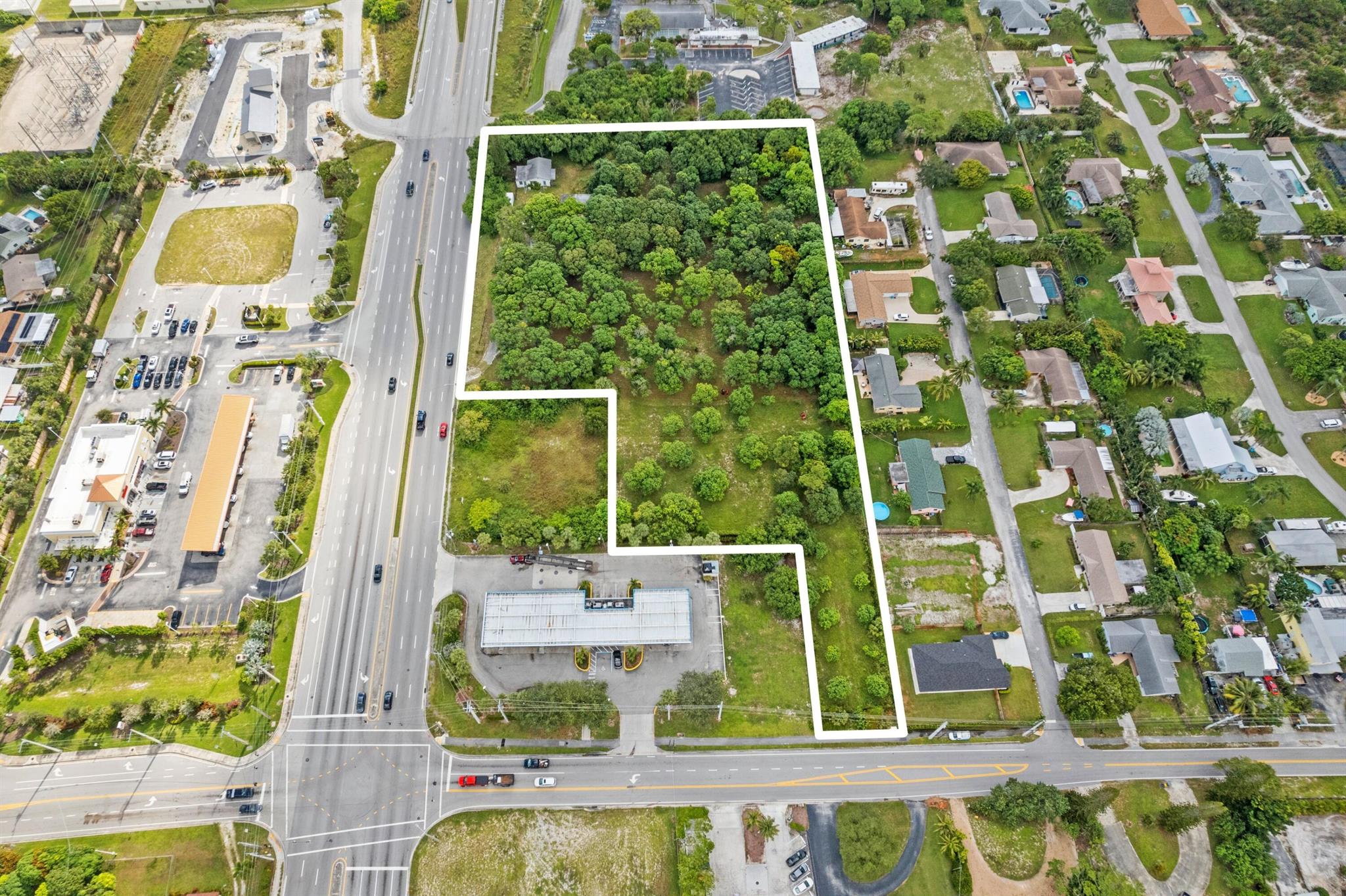 Introducing The Hatcher Mango Farm at 1908 Hypoluxo Road, Lantana, FL- a prime 3.54 acre property (2 parcels) brimming with possibilities. Zoned for future commercial use with higher density opportunity potential while offering high visibility from I-95. This parcel is close proximity to the renowned High Ridge Country Club. Just 10 mins to Palm Beach,15 mins to Downtown West Palm Beach and Palm Beach International Airport. The property has duel entry access between Hypoluxo and High Ridge Road. Don't miss this remarkable opportunity.