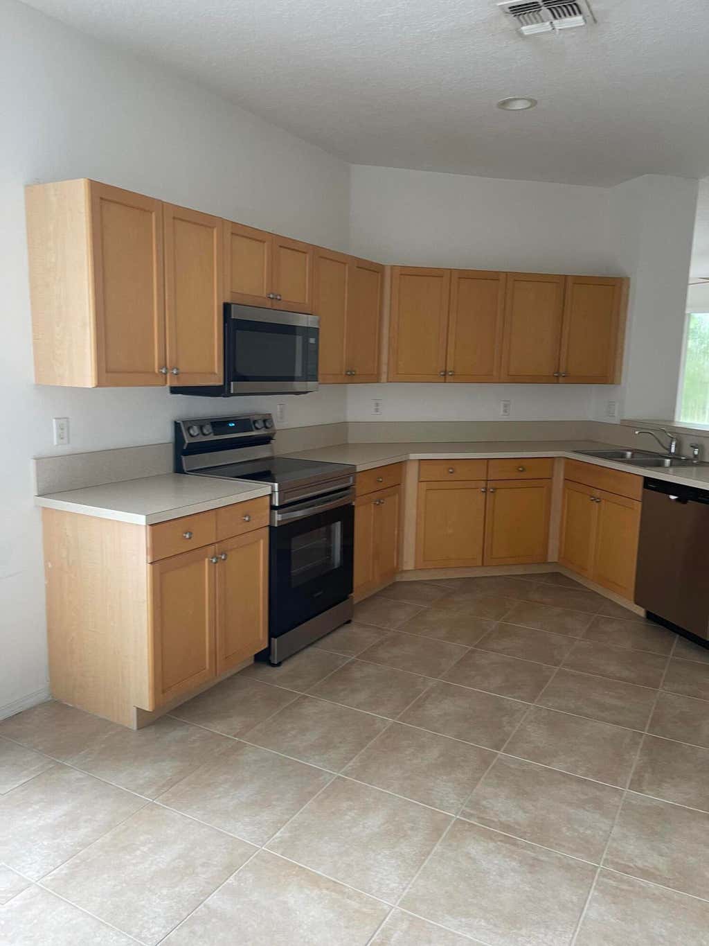Photo of 10045 SW Stonegate Drive, Port Saint Lucie, FL 34987 (MLS # R10927774)