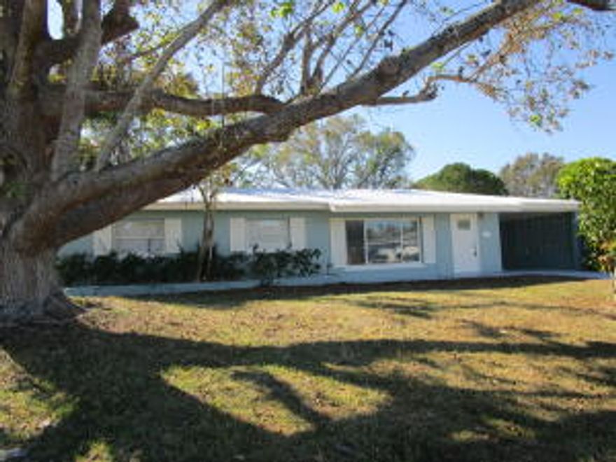 Remodeled! Possible 2 Master suites or Mother-In-Law with private entrance. Block 4 bedrooms, 3 full baths,HUGE family room & car carport with large covered storage. All new kitchen with island & stainless & granite! New vanities with granite! New laminate flooring & tile through-out. Full size utility room with washer & dryer. Brand NEW METAL roof, open patio, large back yard with mature shade trees. Loads of closets, paddle fans, kitchen pass through to family room. City water,  Freshly painted inside & out!