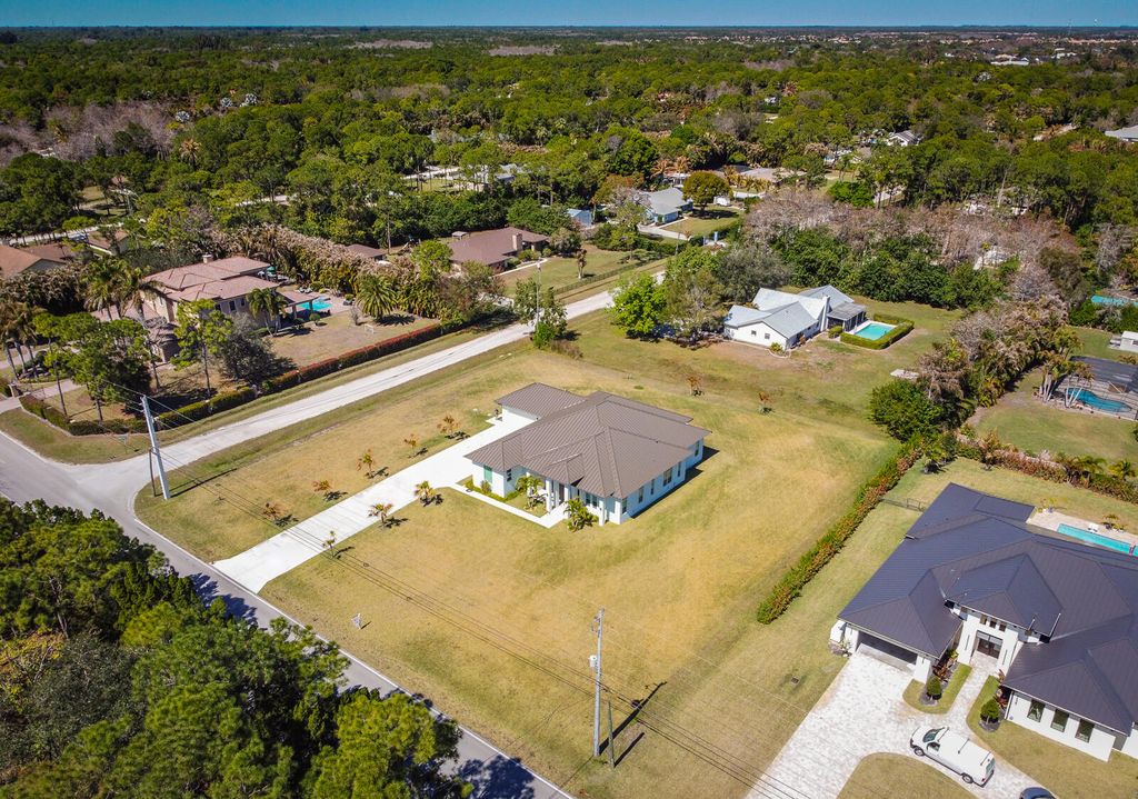 Photo of 7595 155th Place N, Palm Beach Gardens, FL 33418 (MLS # R11166393)