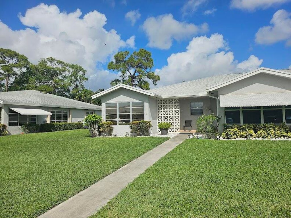 Photo of 14628 Canalview Drive #A, Delray Beach, FL 33484 (MLS # B26012306)