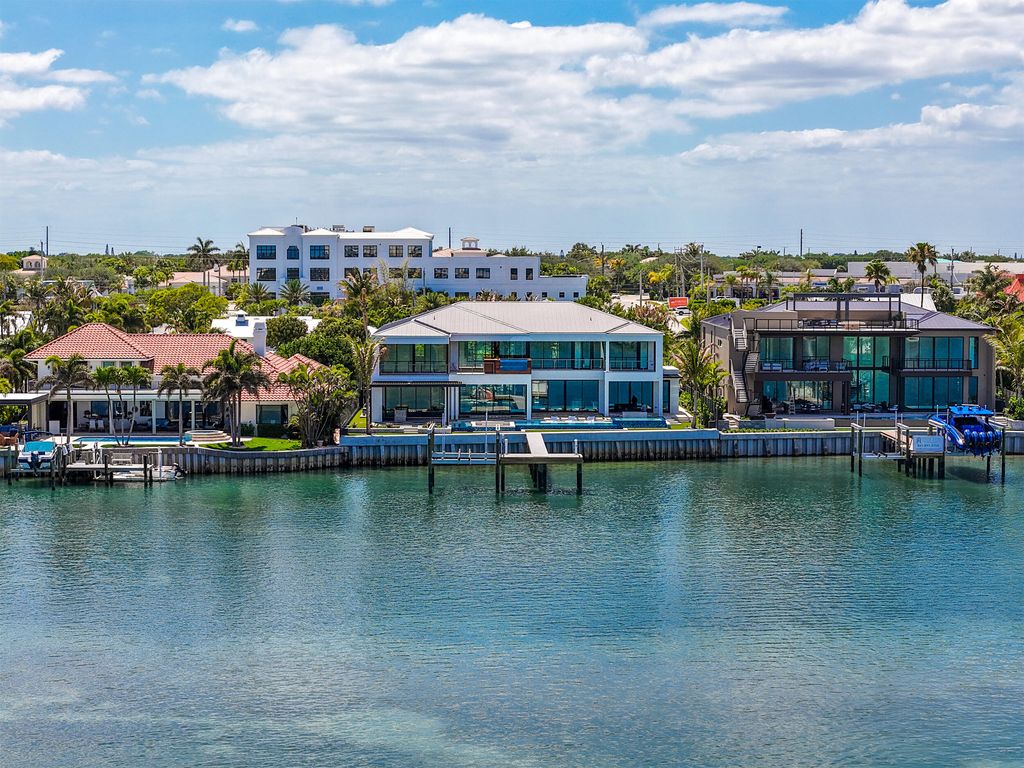 Photo of 19709 Harbor Road N, Jupiter, FL 33469 (MLS # B26013778)