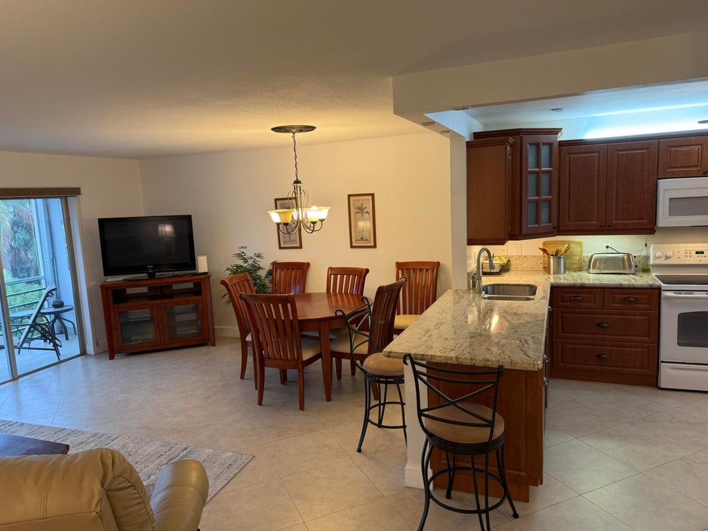 Photo of 300 NE 14th Avenue #411, Hallandale Beach, FL 33009 (MLS # B26031949)