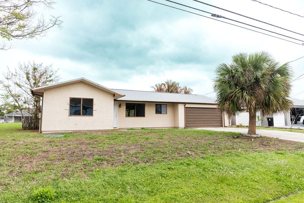 Photo of 473 SW Whitmore Drive, Port Saint Lucie, FL 34984 (MLS # B26004136)