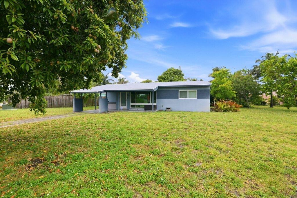 Photo of 2421 SW 16th Street, Fort Lauderdale, FL 33312 (MLS # B26020161)