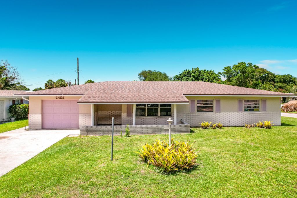 Photo of 2402 Newport Drive, Fort Pierce, FL 34982 (MLS # B26030334)