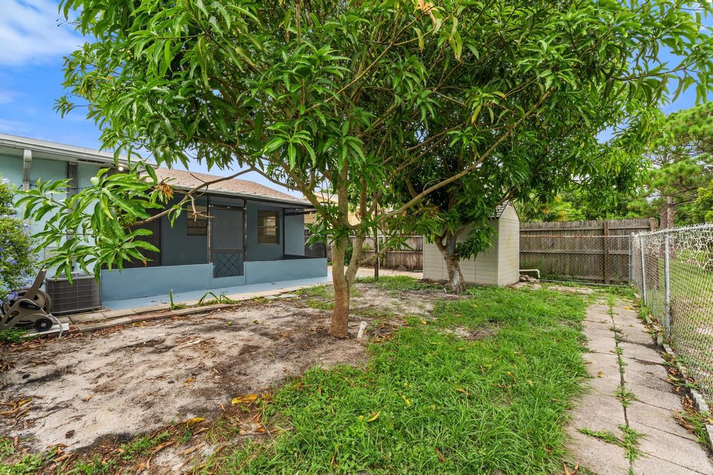 Photo of 911 Sumter Road W, West Palm Beach, FL 33415 (MLS # R11108778)