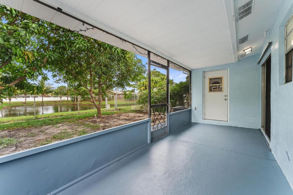 Photo of 911 Sumter Road W, West Palm Beach, FL 33415 (MLS # R11108778)