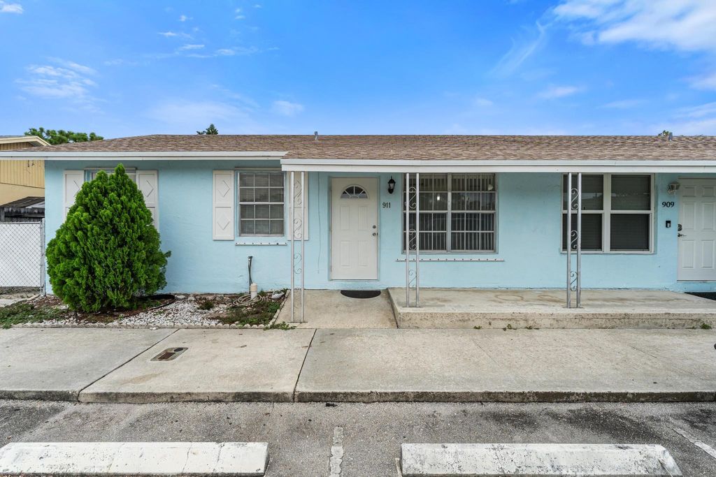 Photo of 911 Sumter Road W, West Palm Beach, FL 33415 (MLS # R11108778)