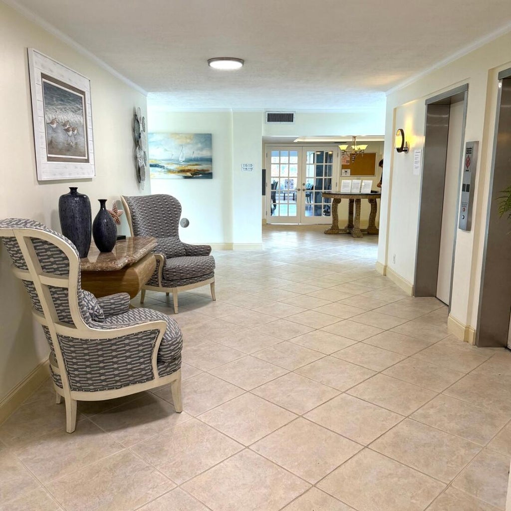 Photo of 801 Lake Shore Drive #411, Lake Park, FL 33403 (MLS # R11157157)
