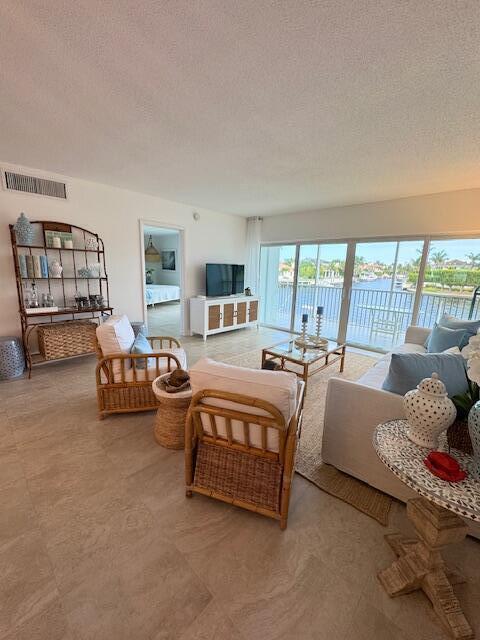 Gorgeous fully furnished and equipped seasonal rental in River House Towers. Direct waterfront 2nd floor unit next to elevator. Large screened in balcony with spectacular 180 degree views. Enjoy time by the waterfront pool or grilling by the docks. Minutes away from Downtown Boca Raton and beautiful Deerfield Beach. Assigned covered parking. Minimum rental is 4 months.All Utilities included. (cable, internet, electricity and water) *In addition to the total rent charged, a tax of 13% will be added for any lease less than 6 months.