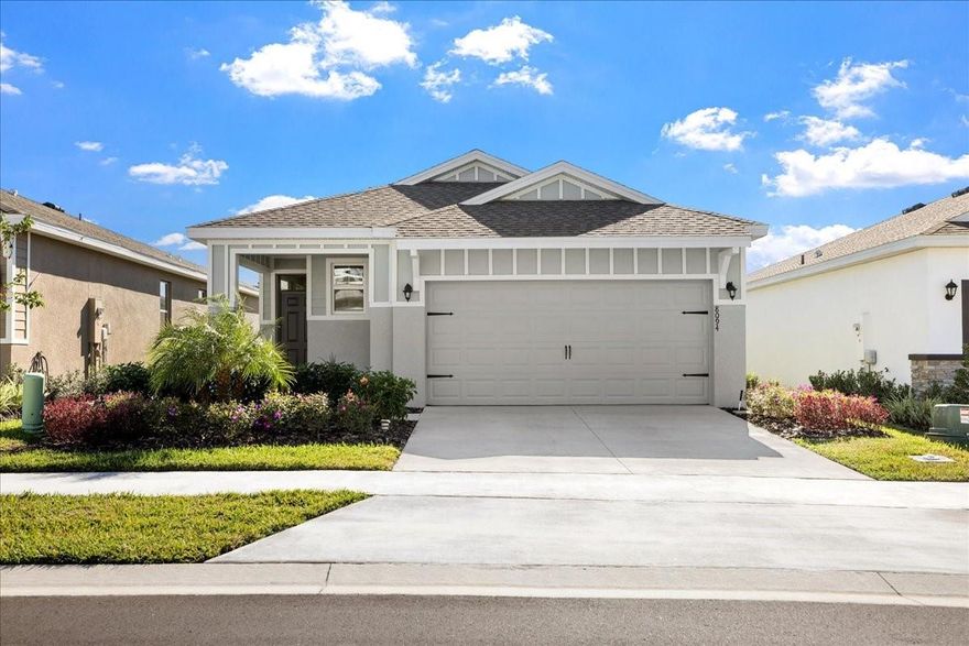 Immaculate home with a ton of upgrades!  Premium lot! Smart home technology! An additional water meter was installed for the irrigation system for a huge savings on your water/sewer bill! Granite countertops and stainless steel appliances, 9 Foot ceilings. Tile flooring throughout common areas and plush carpet in the bedrooms. Epoxy flooring in the garage and beautiful upgraded landscaping added to the front! Extended warranty on the AC unit approximately 8.5 years left and 3.5 years on the washer, dryer and refrigerator! Community amenities include a pool, clubhouse, exercise room, pickleball, bocce ball, and walking trails and lawn care.