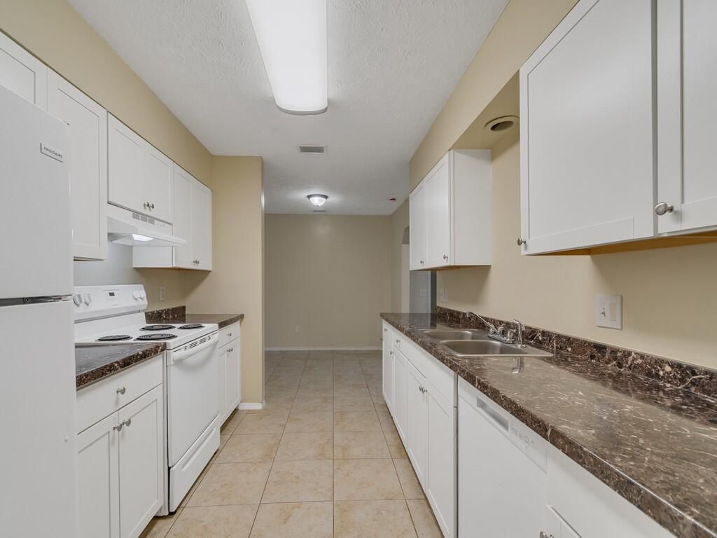 Photo of 1166 SE Preston Lane, Port Saint Lucie, FL 34983 (MLS # B26015144)