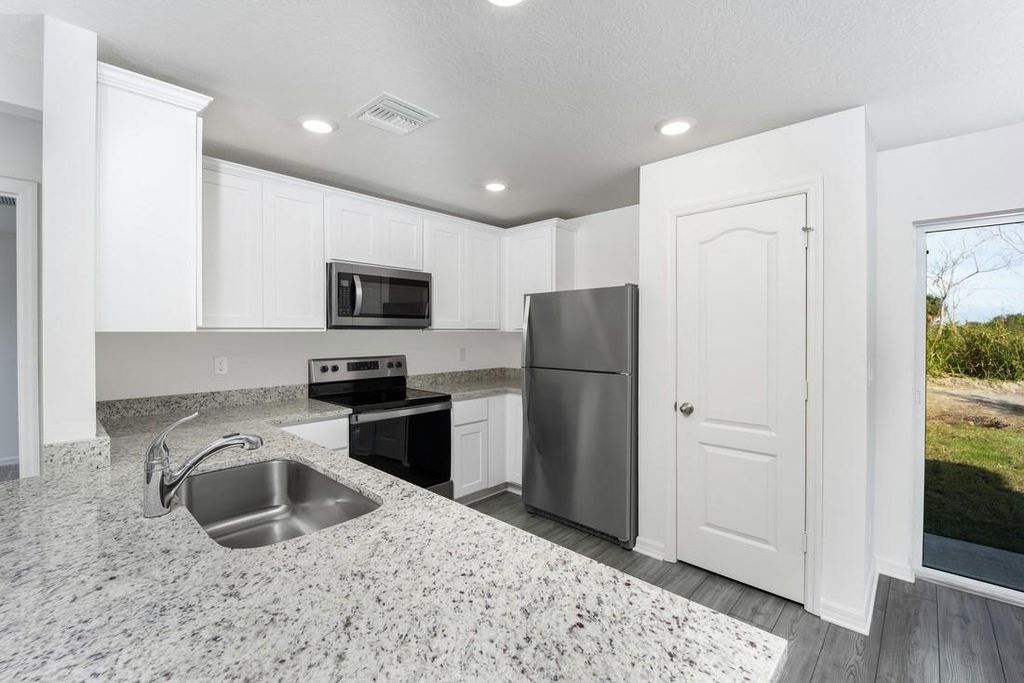 Photo of 5248 Imagination Drive, Fort Pierce, FL 34947 (MLS # F10421991)