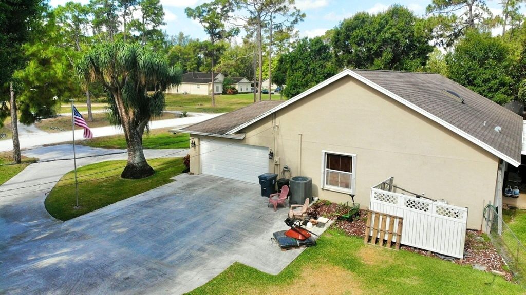 Photo of 14073 78th Place N, Loxahatchee, FL 33470 (MLS # R10994491)