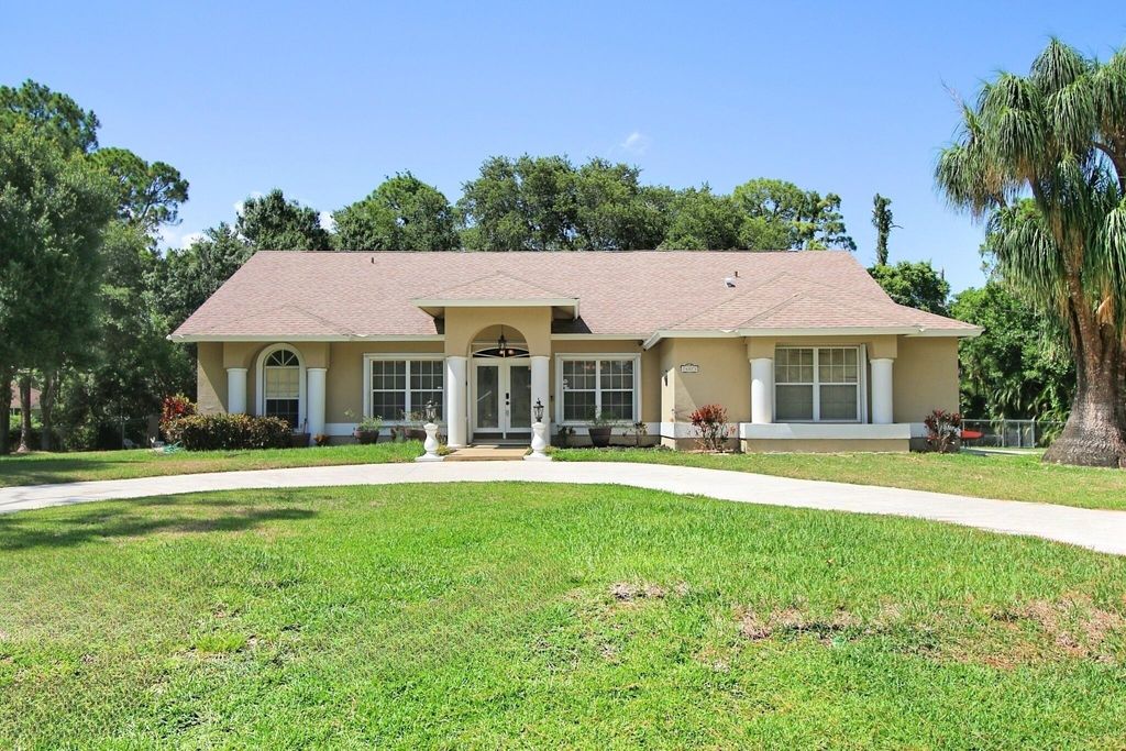 Photo of 14073 78th Place N, Loxahatchee, FL 33470 (MLS # R10994491)