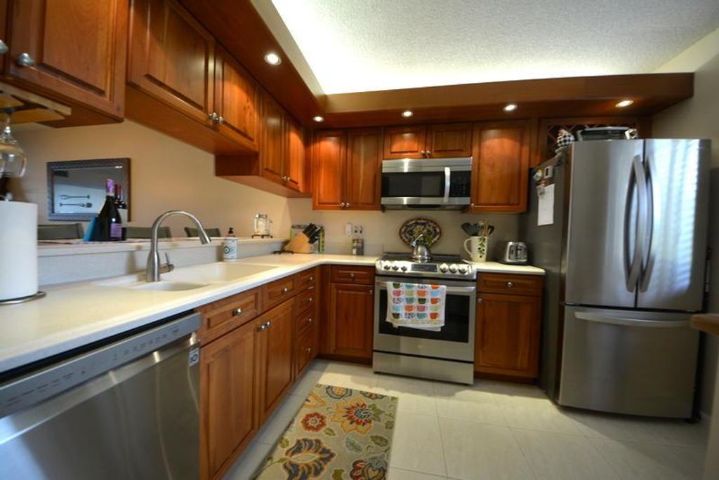 Photo of 2401 Marina Isle Way #105, Jupiter, FL 33477 (MLS # R10972203)