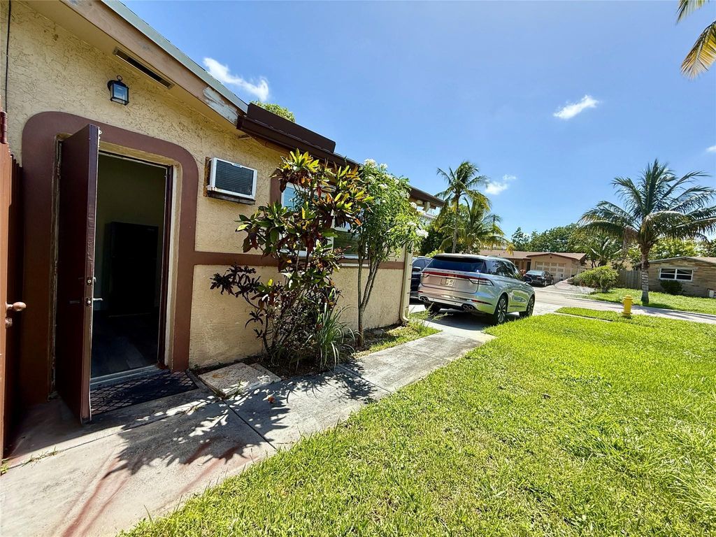 Photo of 3548 NW 39th Avenue, Lauderdale Lakes, FL 33309 (MLS # B26025995)