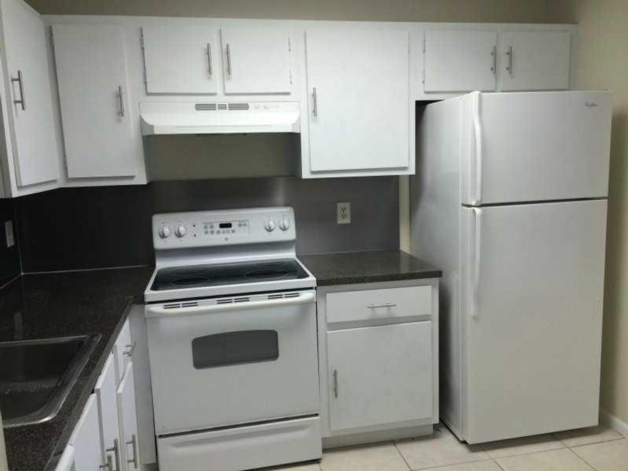 Excellent 2 bed/2 full bath unit on 2nd floor located in the heart of Miramar. Tile floor throughout the unit, updated kitchen and bathrooms, freshly painted, walking closet, A/C just serviced, Washer & dryer inside the unit. Gated complex with a guard on  site, community pool, close to Schools, walking distance to Wal-Mart, centrally located to all major Highways, lots of restaurants and more !!! This apartment is ready to move-in. Easy to show, on Lockbox. Please use show assist.