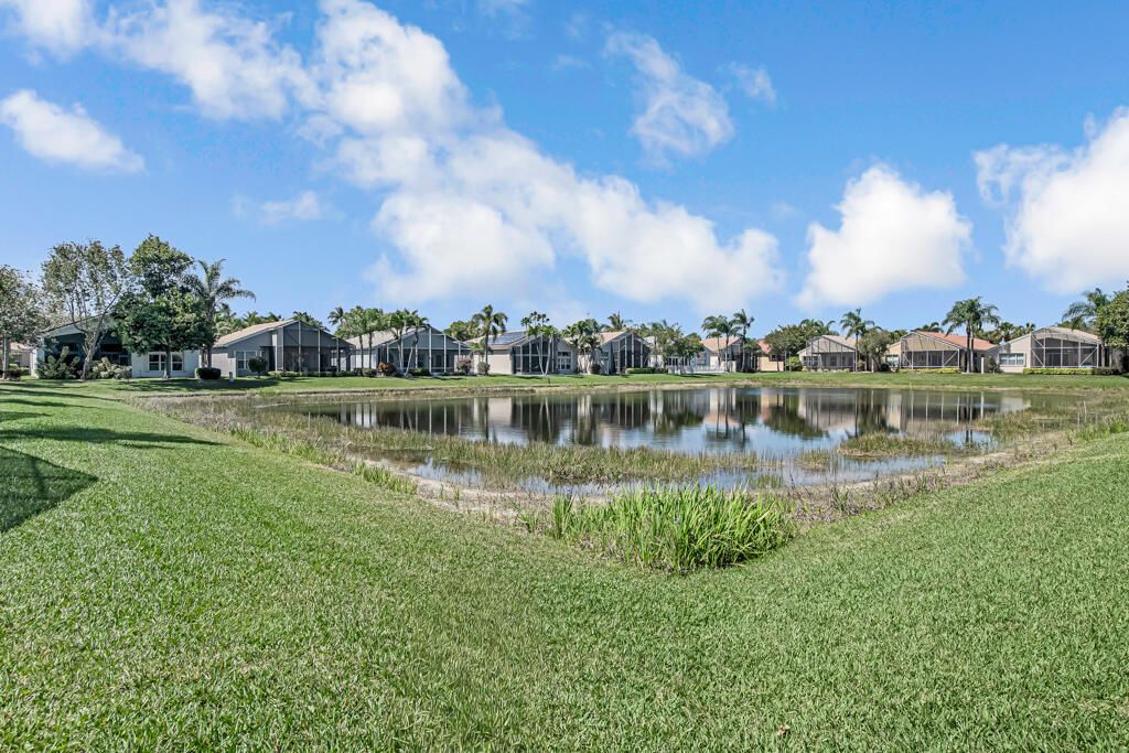 Photo of 7775 Ocean Sunset Dr, Lake Worth, FL 33467 (MLS # B26000497)