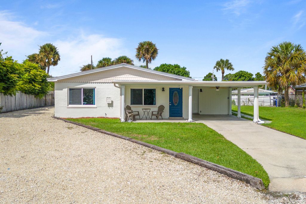 Photo of 1593 NE Orion Street, Jensen Beach, FL 34957 (MLS # R11090898)