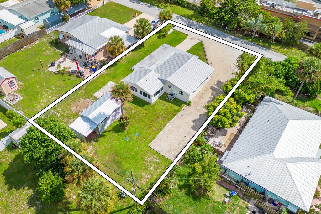 Photo of 1593 NE Orion Street, Jensen Beach, FL 34957 (MLS # R11090898)