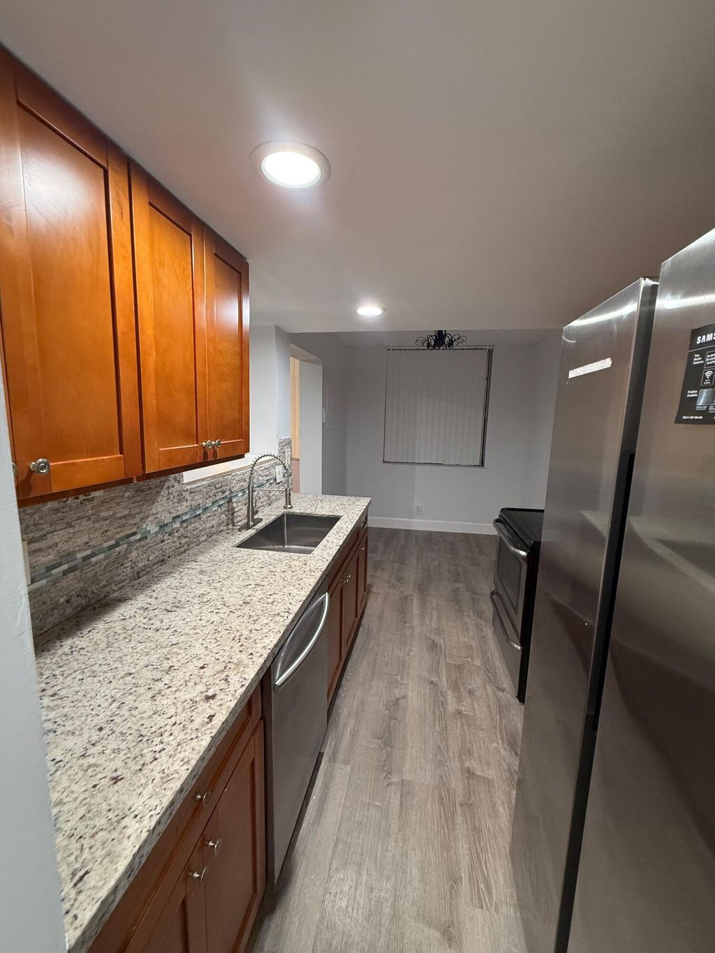 Photo of 6190 Woodlands Boulevard #110, Tamarac, FL 33319 (MLS # B26035591)