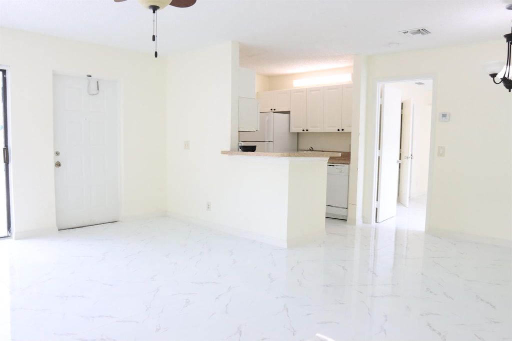 Photo of 20 Crossings Circle #B, Boynton Beach, FL 33435 (MLS # R11108935)