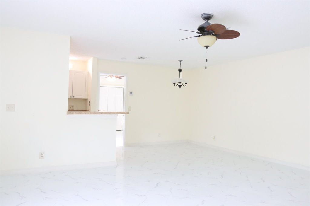 Photo of 20 Crossings Circle #B, Boynton Beach, FL 33435 (MLS # R11108935)