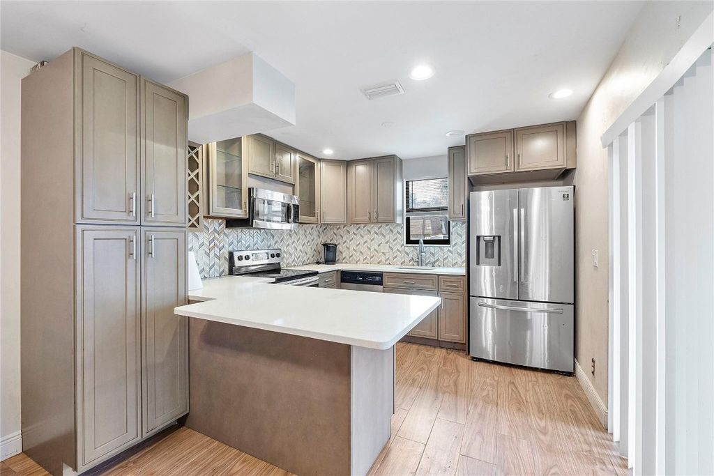 Photo of 2572 NW 99th Avenue #2572, Coral Springs, FL 33065 (MLS # F10535279)