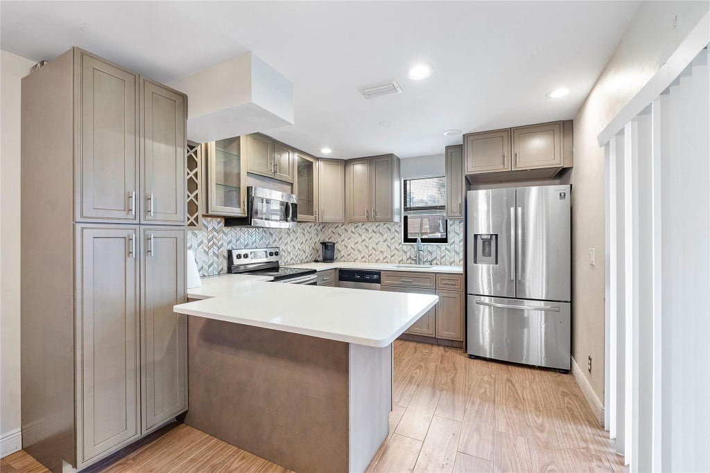 Photo of 2572 NW 99th Avenue #2572, Coral Springs, FL 33065 (MLS # F10535279)