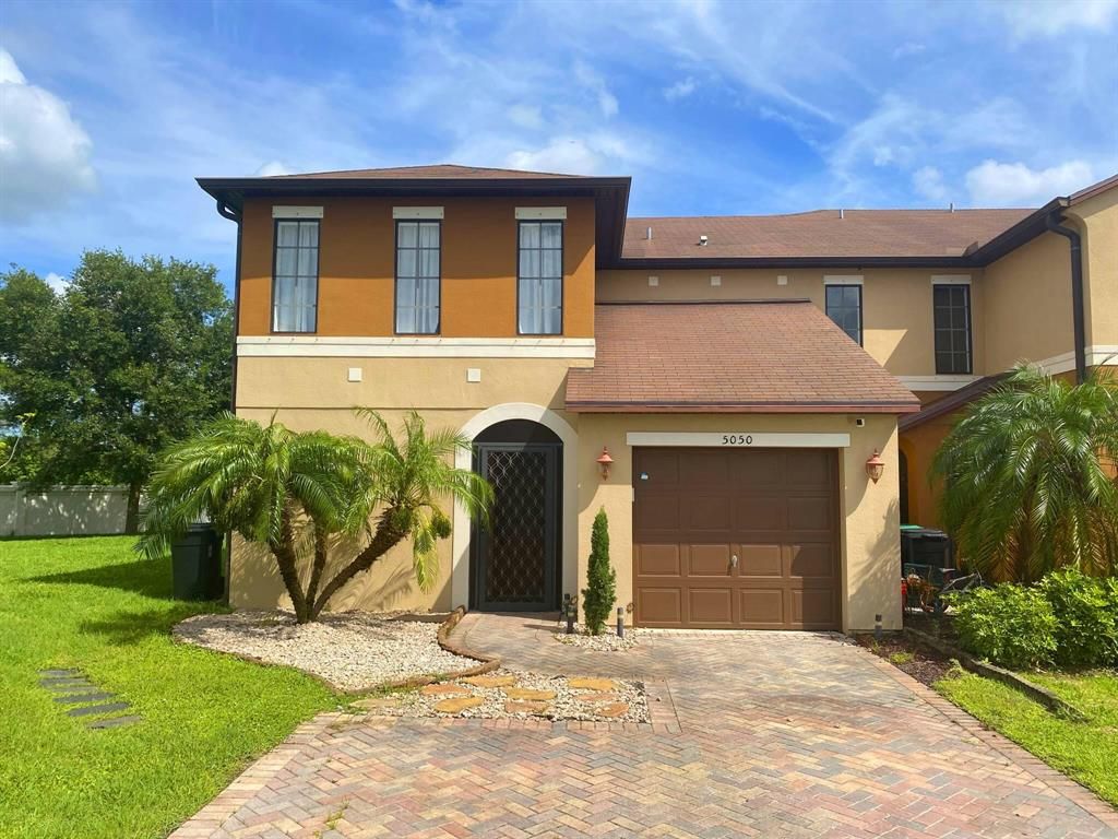 Photo of 5050 NW Coventry Circle, Port Saint Lucie, FL 34986 (MLS # R10733155)