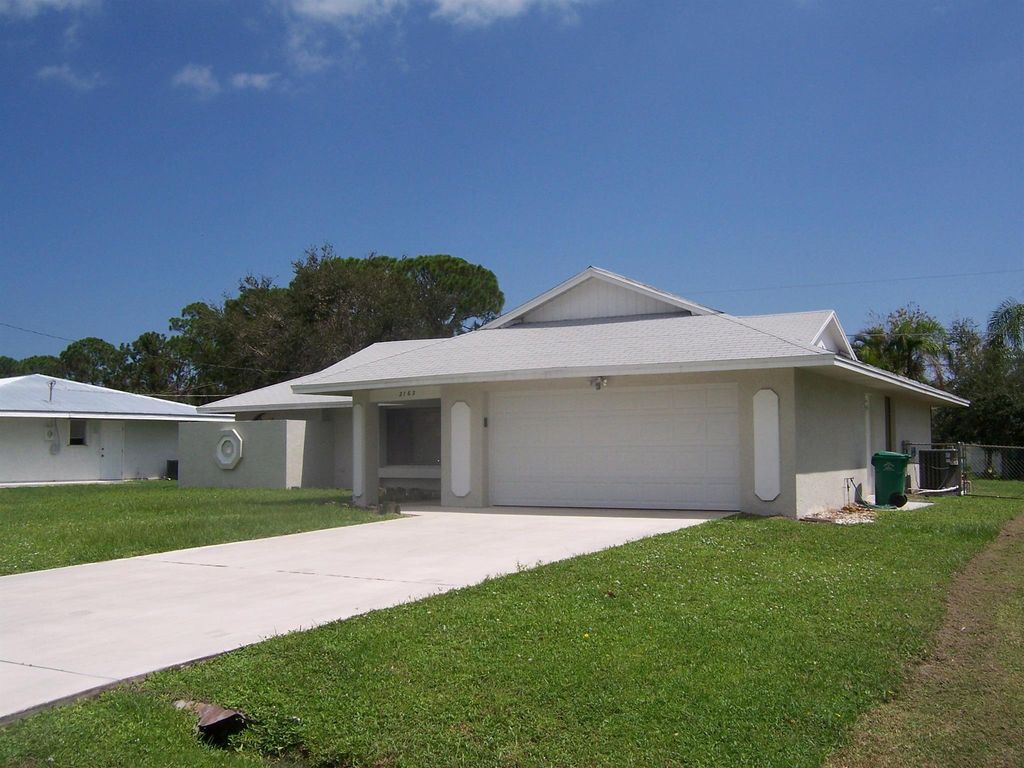 Photo of 2163 SE Shelter Drive, Port St Lucie, FL 34952 (MLS # R11108887)