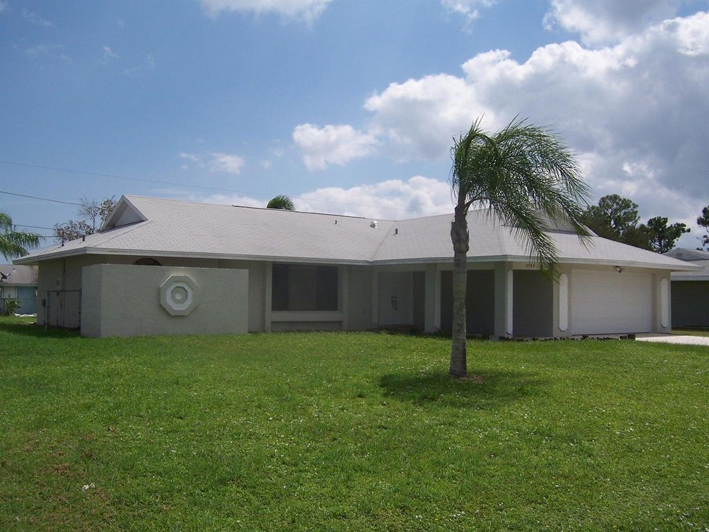 Photo of 2163 SE Shelter Drive, Port St Lucie, FL 34952 (MLS # R11108887)