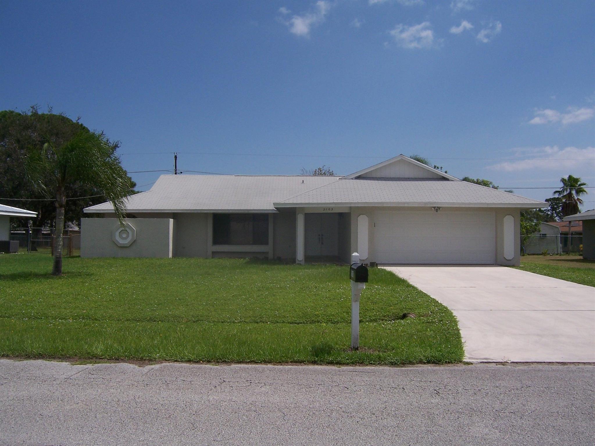 NICE & SPACIOUS 3/2 WITH 2-CAR GARAGE. UPDATED WITH PORCELAIN TILE THROUGHOUT. CEILING FANS. 2'' BLINDS, ETC. VAULTED CEILING, BIG EAT-IN KITCHEN. LARGE BEDROOMS. MASTER BEDROOM WITH SEPARATE ROMAN TUB & SHOWER. LAUNDRY ROOM WITH TUB. BIG SCREENED COVERED PATIO. FENCED YARD. CLOSE TO EVERYTHING. EASY TO SHOW. VACANT OF ELBX. SCHEDULE ONLINE
