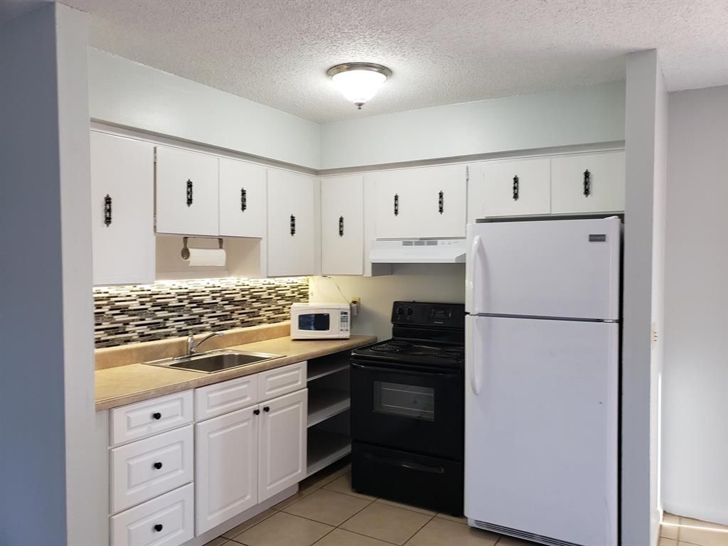 Photo of 4752 SE Ebbtide Avenue, Stuart, FL 34997 (MLS # R10762119)