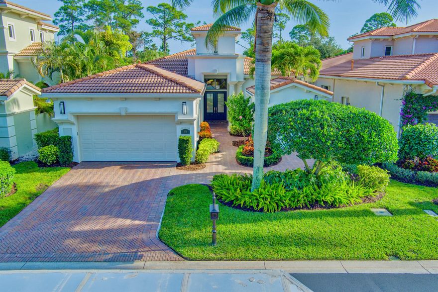 RARE OPPORTUNITY to acquire a newly completed and tastefully renovation home in the renowned Country Club at Mirasol. This residence is a simply stunning jewel box home, ready to move in and enjoy. Upon entry you will be impressed with the artistically laid neutral luxury format natural marble floors that flow throughout all main areas. Custom hardwood trim enhances the architectural ambience; new high baseboards, chair rail and wainscot panel molding plus beautifully detailed trim surround every 8-foot solid door with satin nickel hinges. From the first moments visiting this home the artful blend of sophistication and craftsmanship are dramatically apparent. The graceful interior features soaring arches and ceiling heights, warmly enhanced by new soft tone neutral paint.