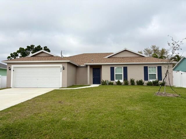 Photo of 202 SW ALDORO Place, Port Saint Lucie, FL 34953 (MLS # B26069079)