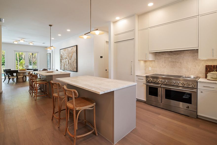 Nestled in one of Pinecrest's most coveted gated communities, this nearly 4,000 SF, fully renovated 4-bedroom, 3-bath residence offers effortless luxury and serene canal-front living. Thoughtfully redesigned and truly turnkey, the home blends refined finishes with warm, livable spaces ideal for both everyday living and entertaining. Set on a picturesque canal and located just minutes from top-rated schools, dining, and shopping, this exceptional property is ready for its next chapter.