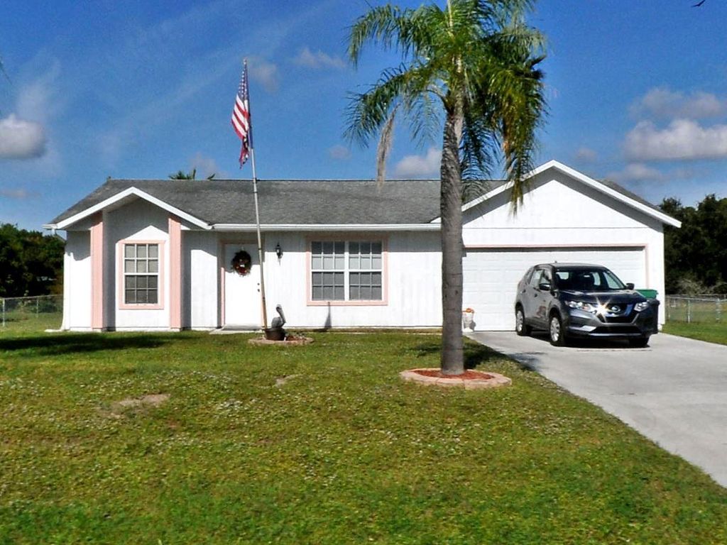 Photo of 135 SW Felix Avenue, Port Saint Lucie, FL 34953 (MLS # R11064513)