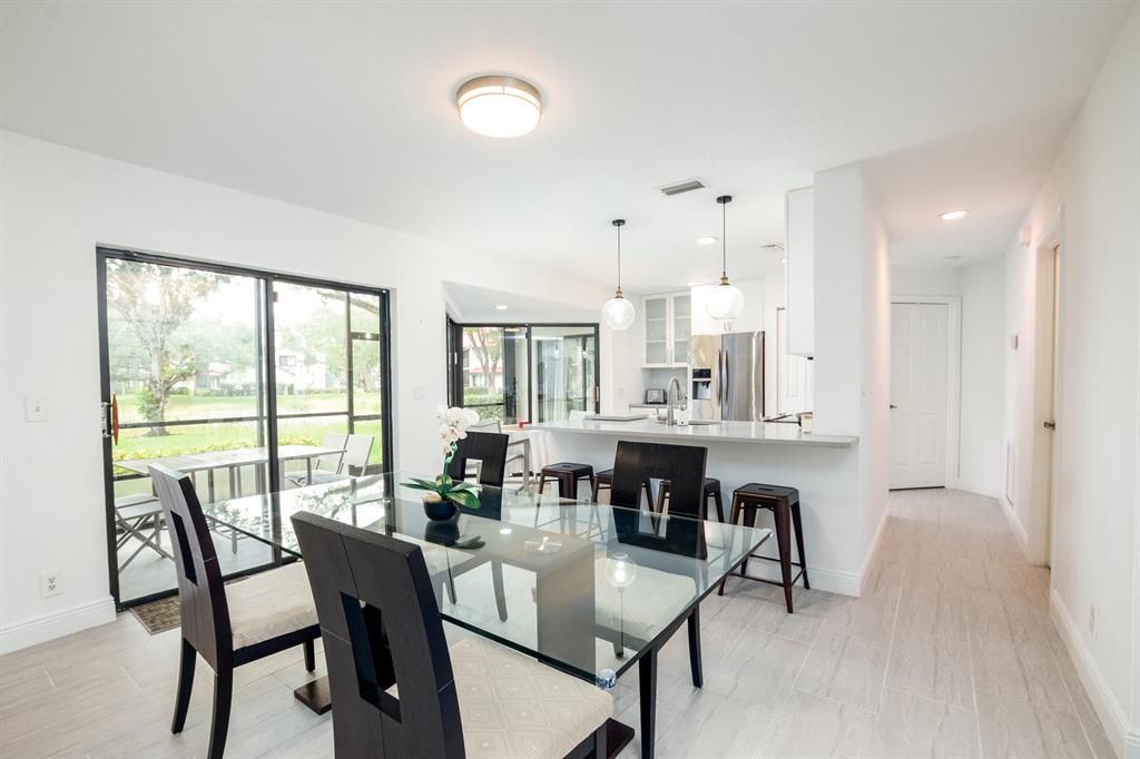 Photo of 3 Lexington Lane E #A, Palm Beach Gardens, FL 33418 (MLS # R10754383)