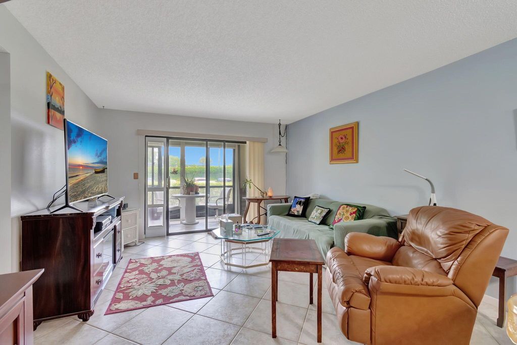 Photo of 15401 Pembridge Avenue #9, Delray Beach, FL 33484 (MLS # R11098578)