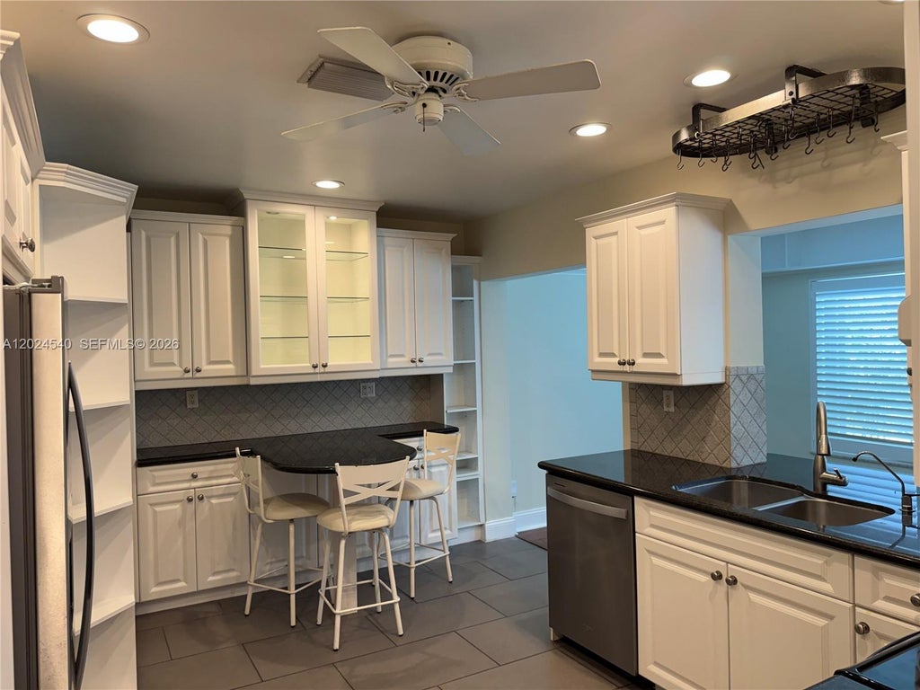 Photo of 1660 NW 42nd Street, Oakland Park, FL 33309 (MLS # A12024540)