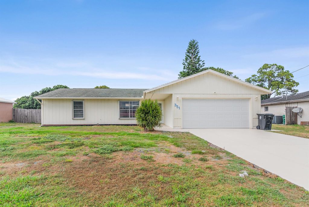Photo of 351 SW Duval Avenue SW, Port Saint Lucie, FL 34953 (MLS # R10986125)