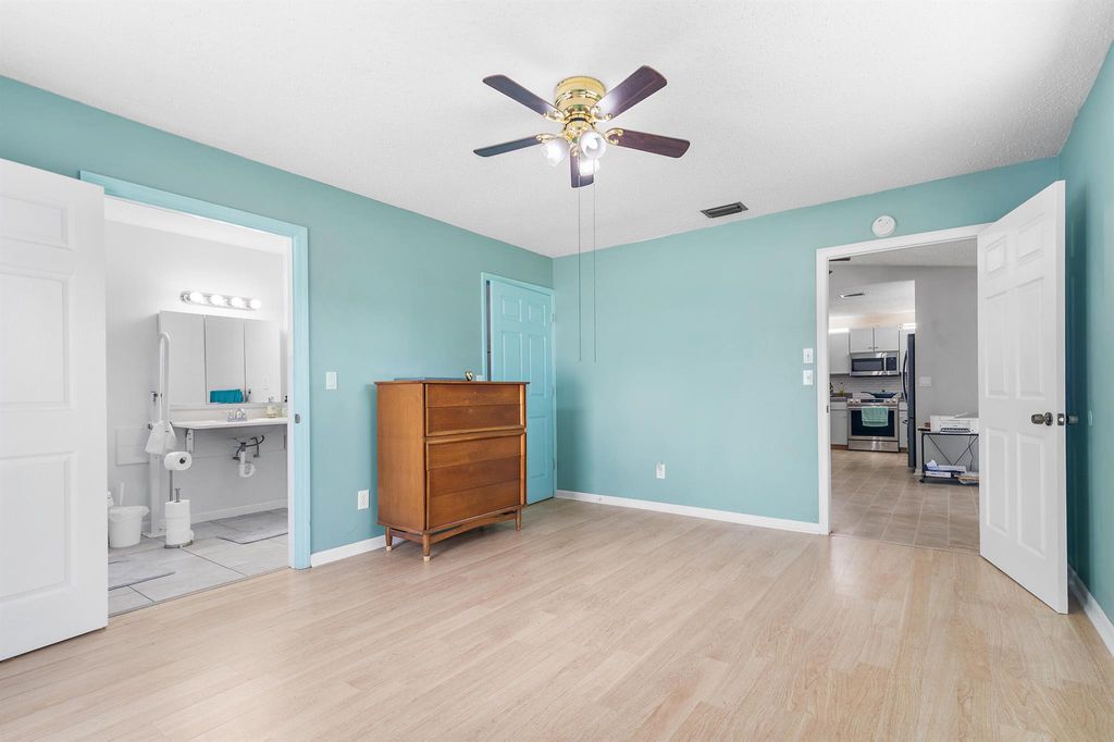 Photo of 351 SW Duval Avenue SW, Port Saint Lucie, FL 34953 (MLS # R10986125)