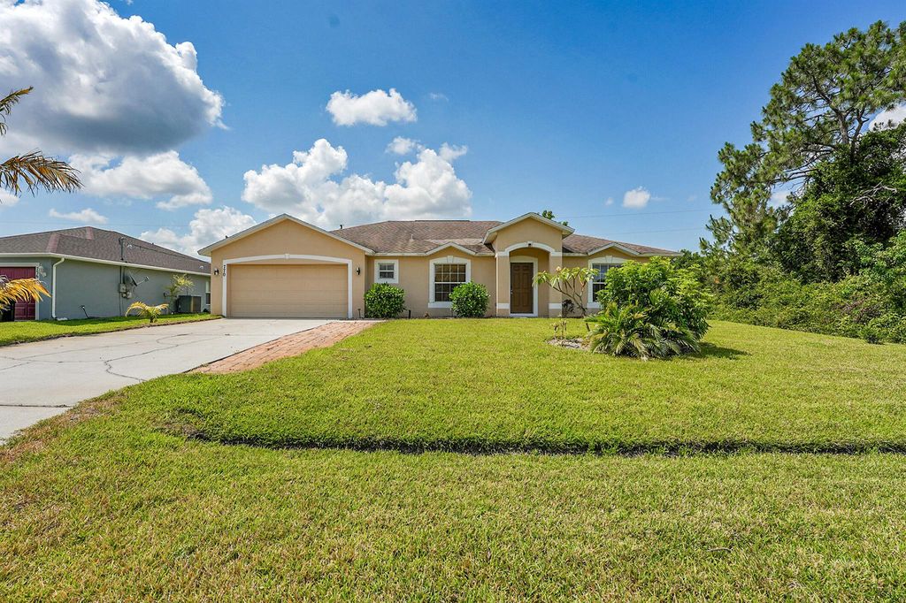 Photo of 770 SW Hamberland Avenue, Port Saint Lucie, FL 34953 (MLS # R11087972)