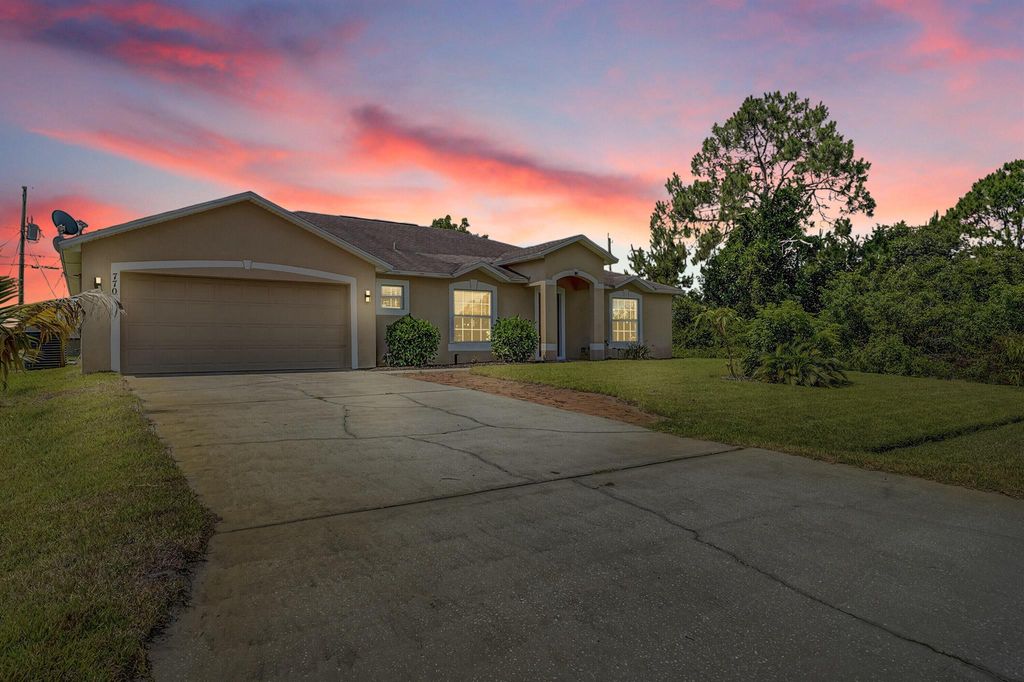 Photo of 770 SW Hamberland Avenue, Port Saint Lucie, FL 34953 (MLS # R11087972)