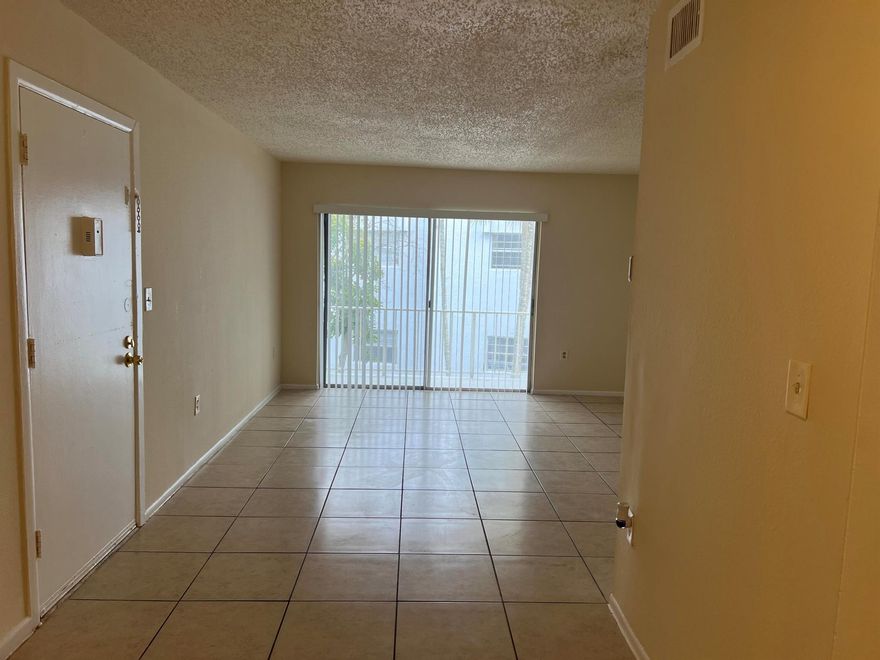Bright 2 confortables bedrooms, ample closets space, 2nd floor, Tile floors, spacious living area, and great natural light.  Just minutes from downtown, I-95, PBI Airport, and Palm Beach Outlets. Fantastic location, Great Amenities and Laundry facilities.  Just painted. Water included on the rent.